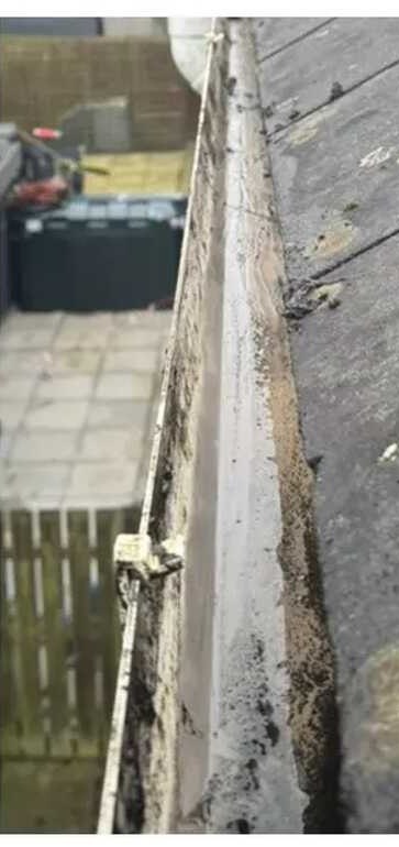 The same gutter emptied after vacuuming